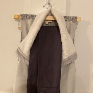 Vest, leggings, beauty supplies